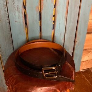 Men’s Wearhouse black Italian full grain leather belt size 44 silver tone